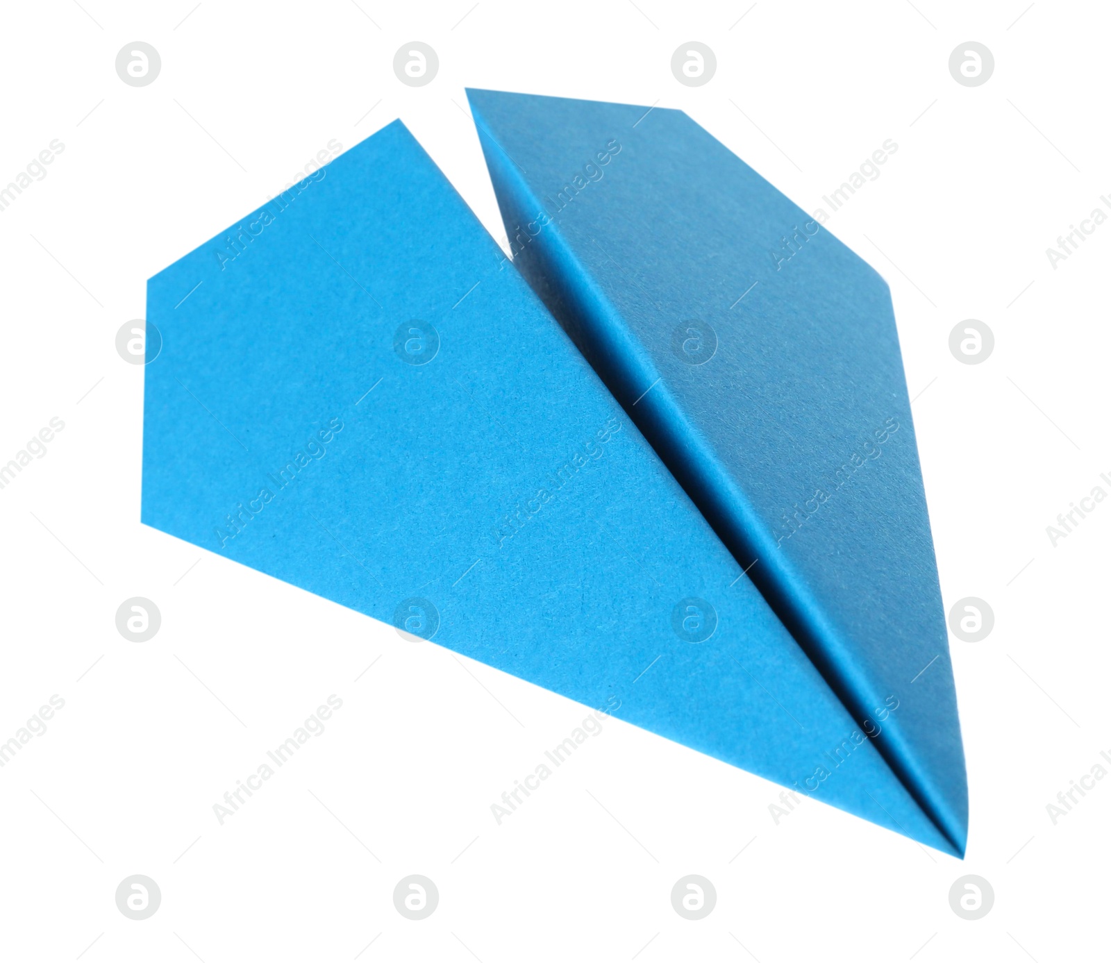 Photo of One handmade light blue paper plane isolated on white