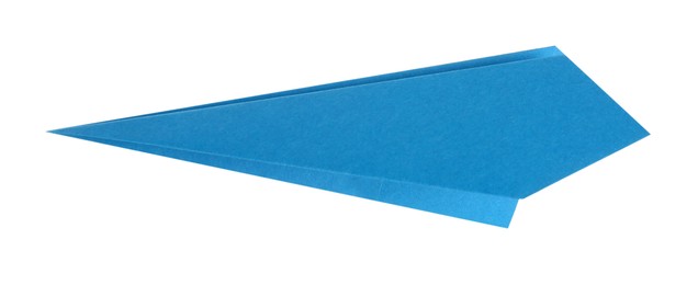 Photo of One handmade light blue paper plane isolated on white