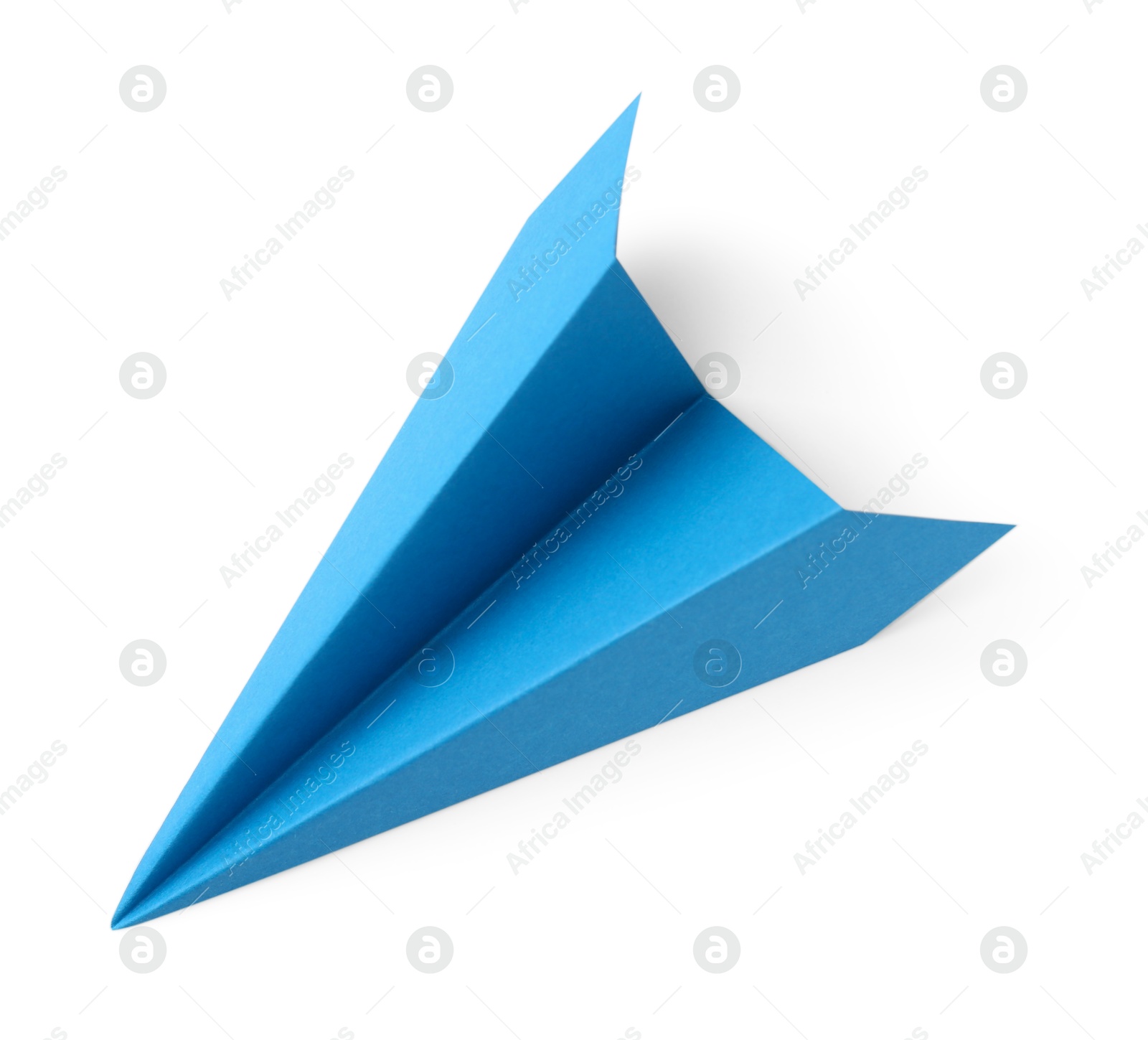 Photo of One handmade light blue paper plane isolated on white, top view