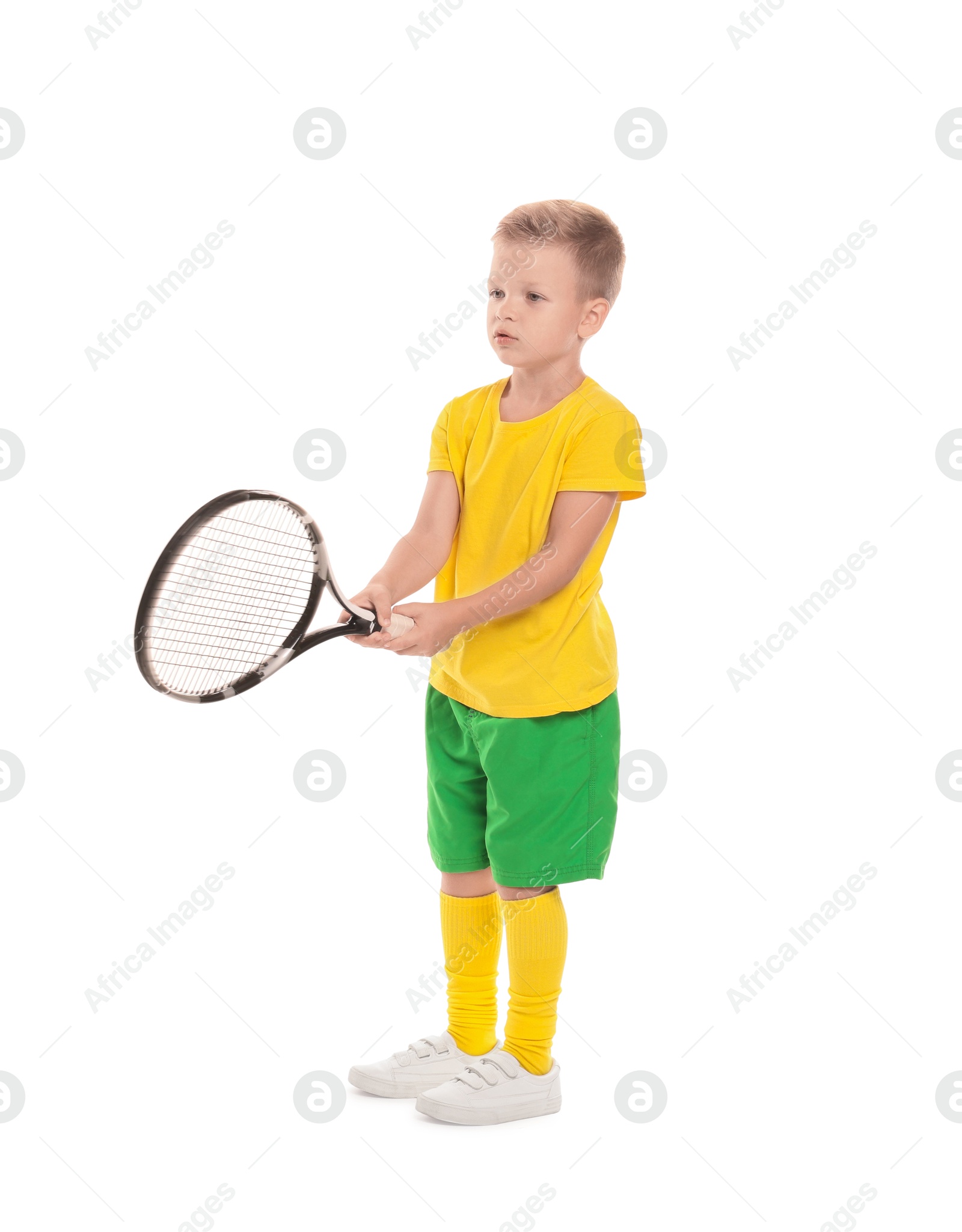 Photo of Little boy with tennis racket on white background