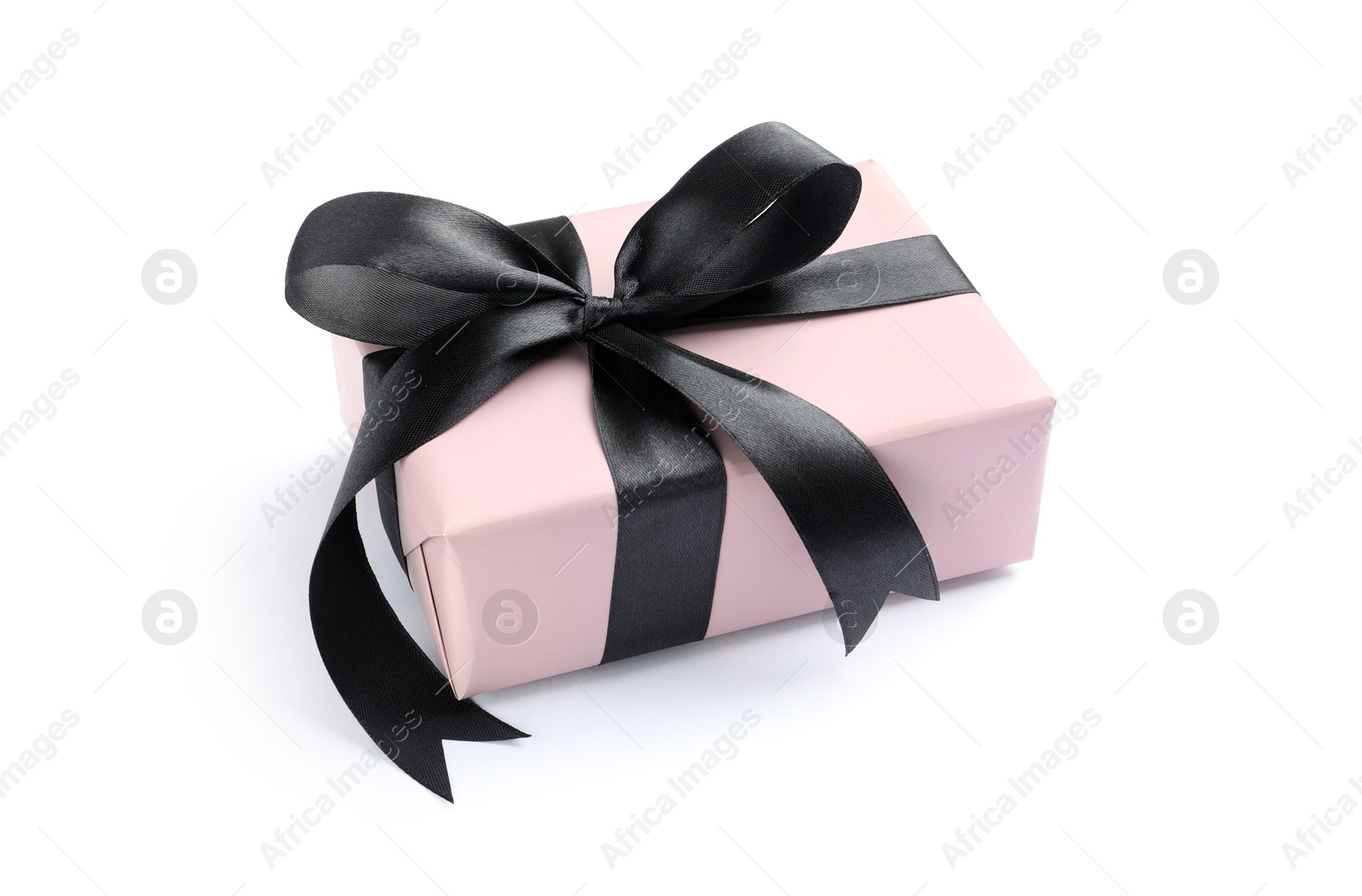 Photo of Beautiful gift box with black bow isolated on white