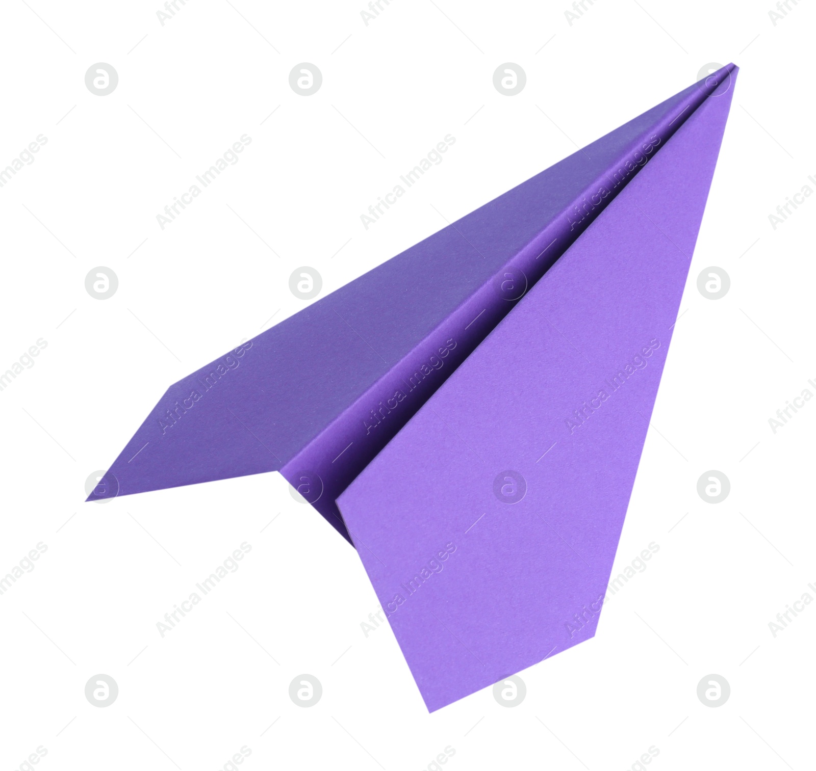 Photo of One handmade purple paper plane isolated on white