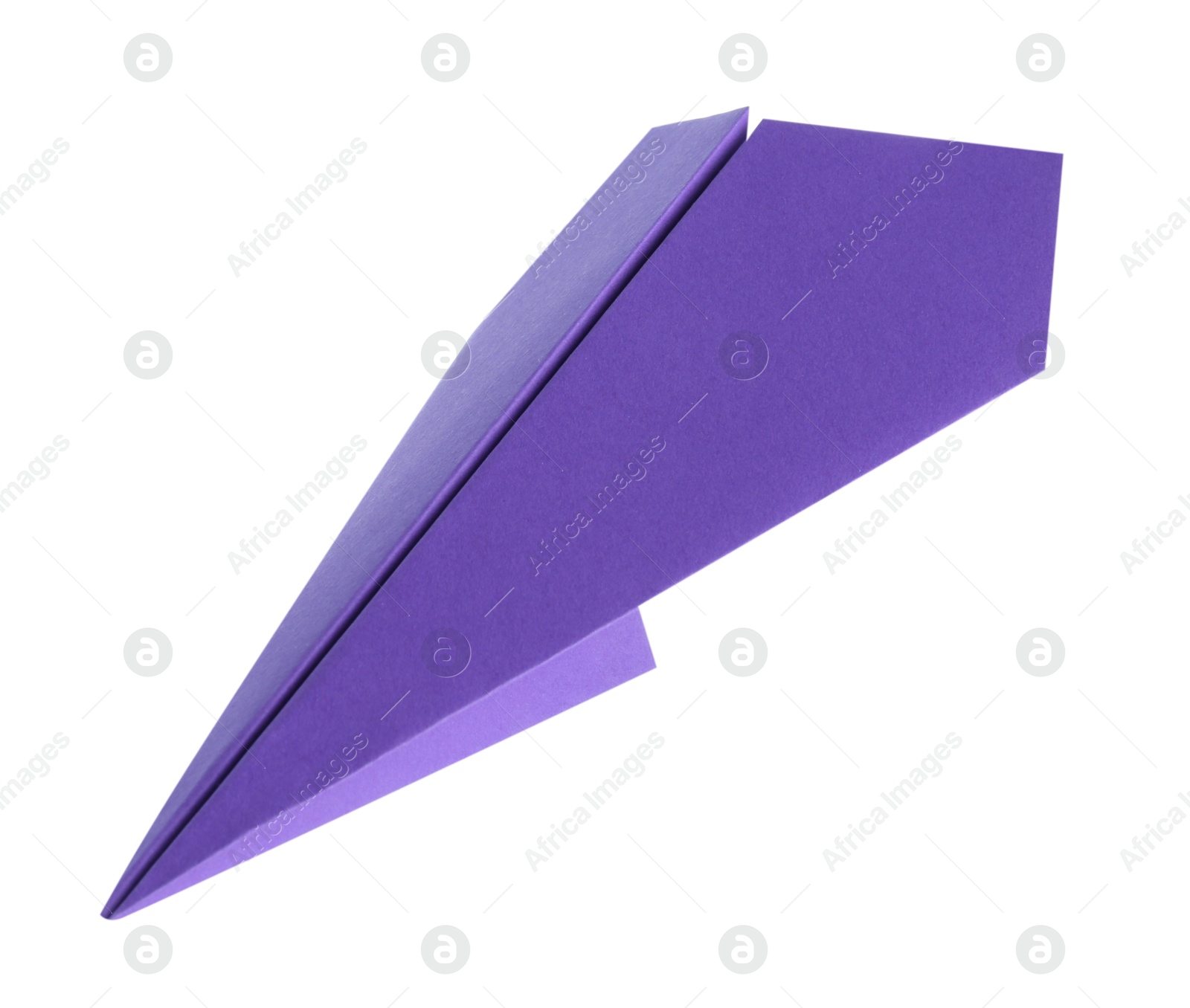 Photo of One handmade purple paper plane isolated on white