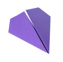 Photo of One handmade purple paper plane isolated on white