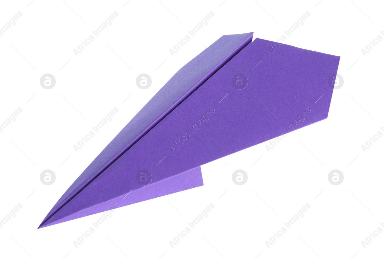 Photo of One handmade purple paper plane isolated on white