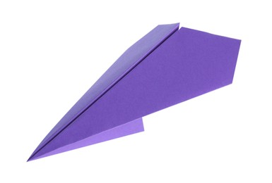 Photo of One handmade purple paper plane isolated on white