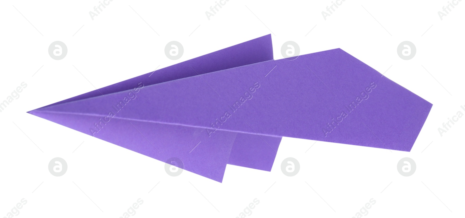 Photo of One handmade purple paper plane isolated on white