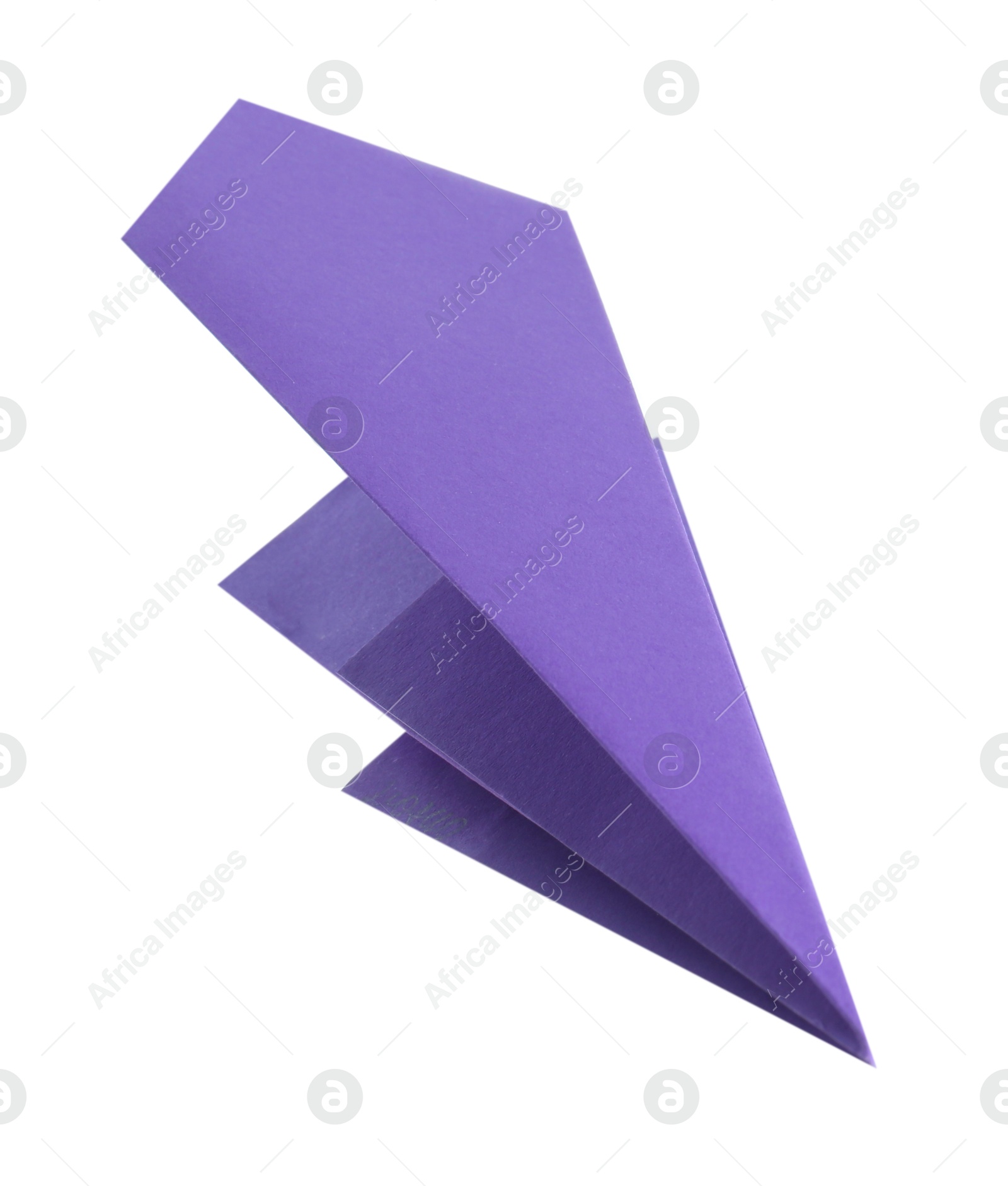 Photo of One handmade purple paper plane isolated on white