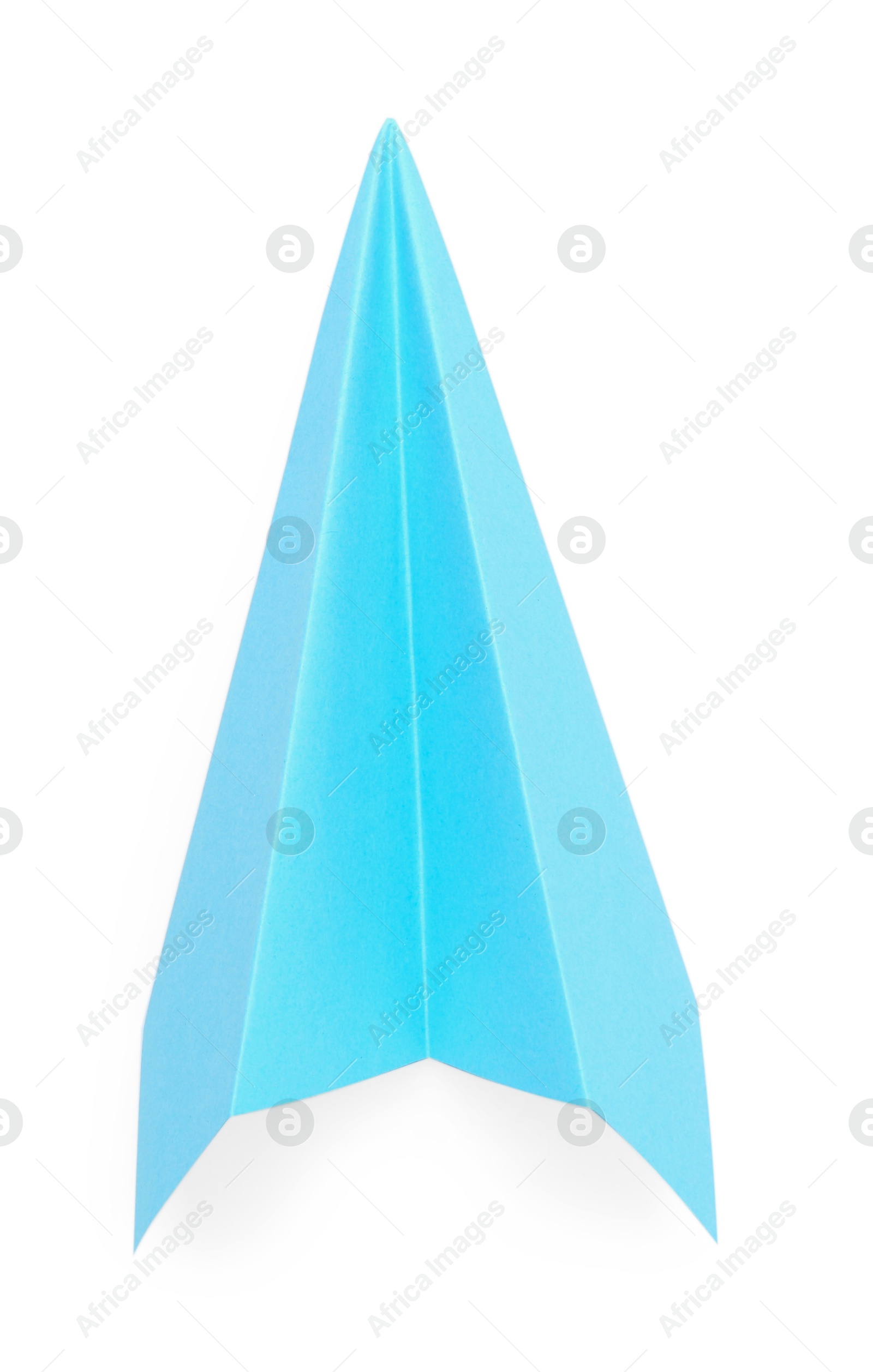 Photo of One handmade light blue paper plane isolated on white, top view