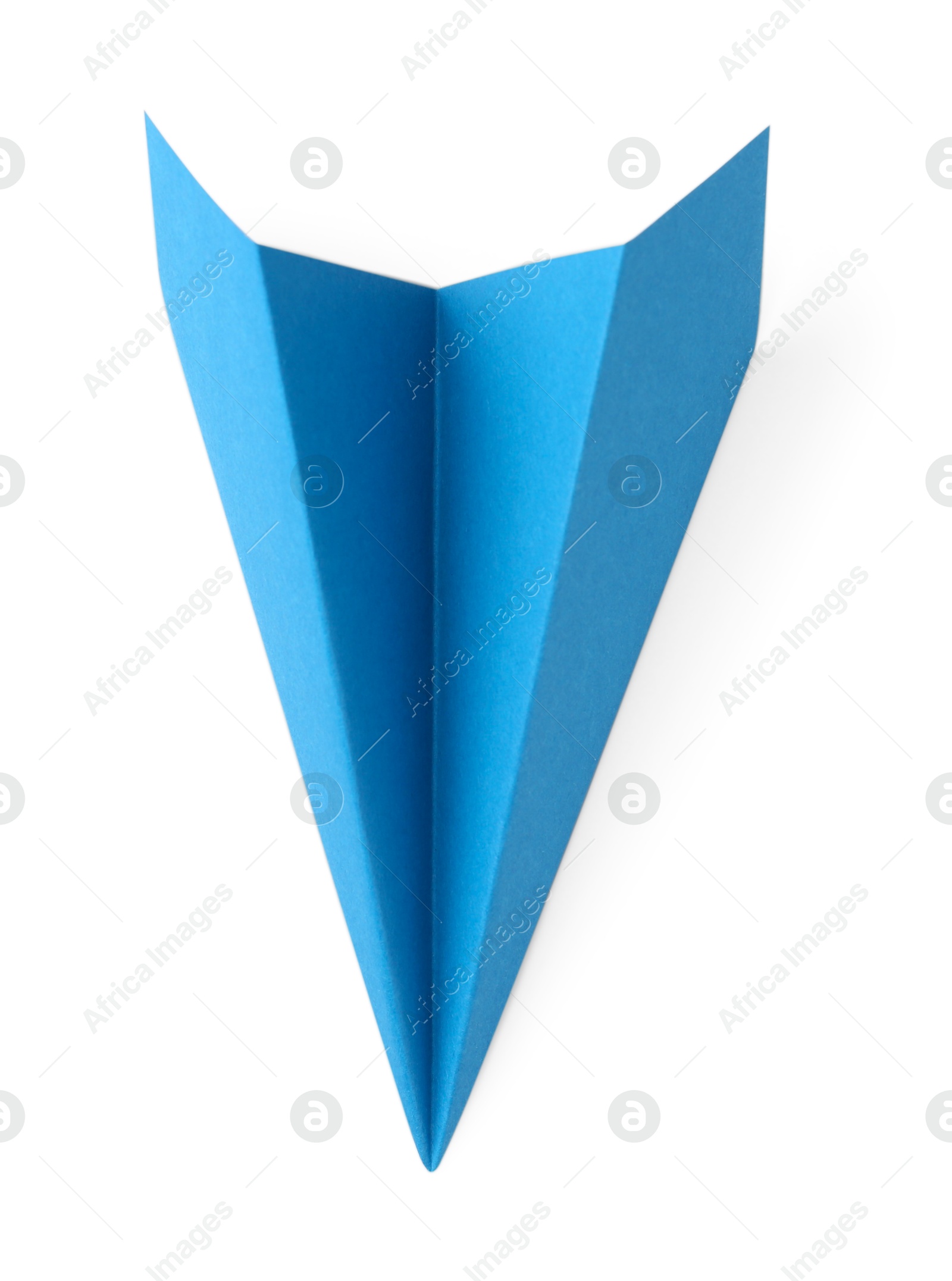 Photo of One handmade light blue paper plane isolated on white, top view