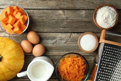 Photo of Different ingredients for pumpkin pancakes on wooden table, flat lay. Space for text