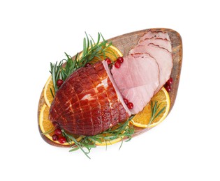 Christmas food. Tasty baked ham, oranges and cranberries isolated on white, top view