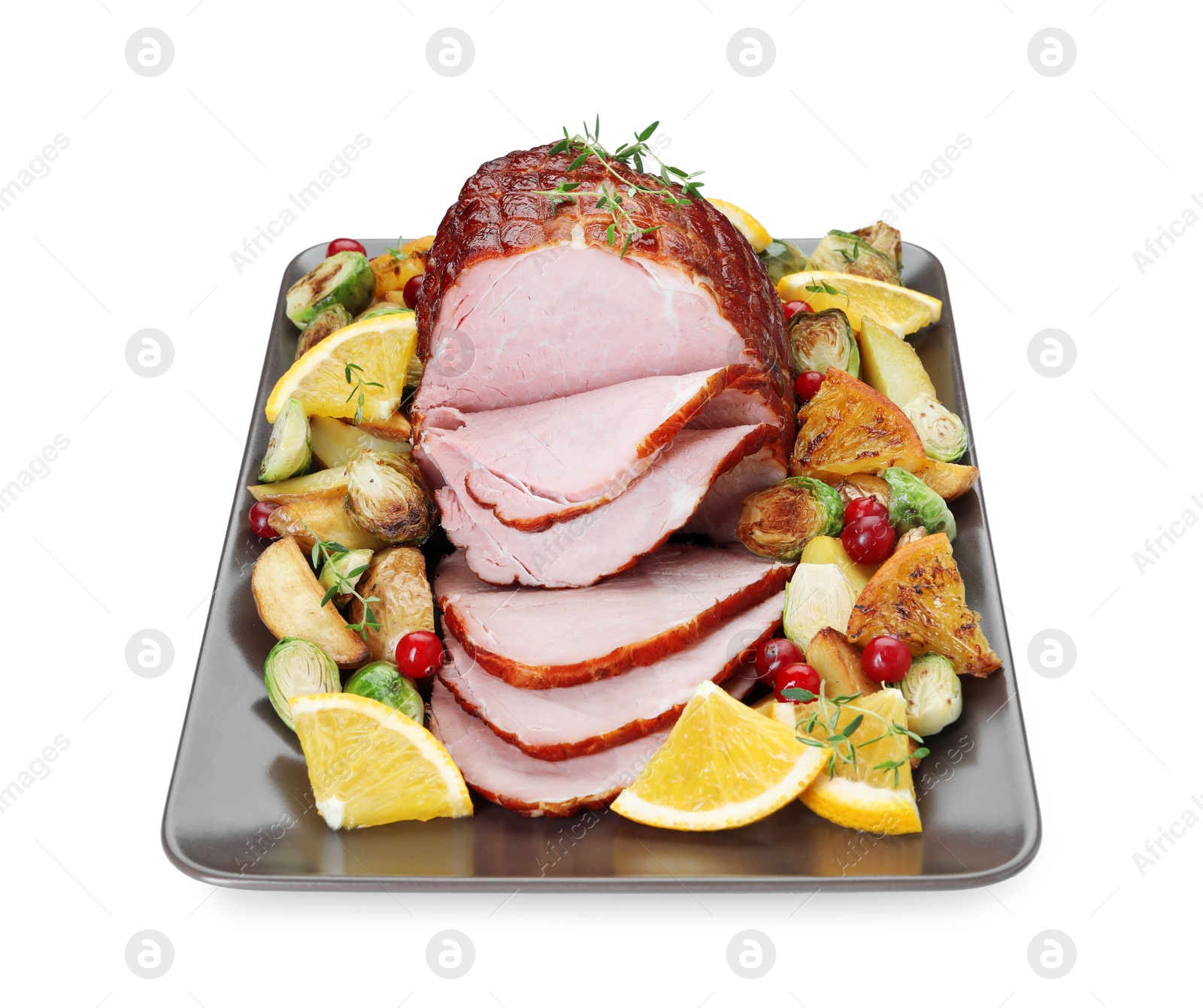 Photo of Tasty baked ham, vegetables and oranges isolated on white