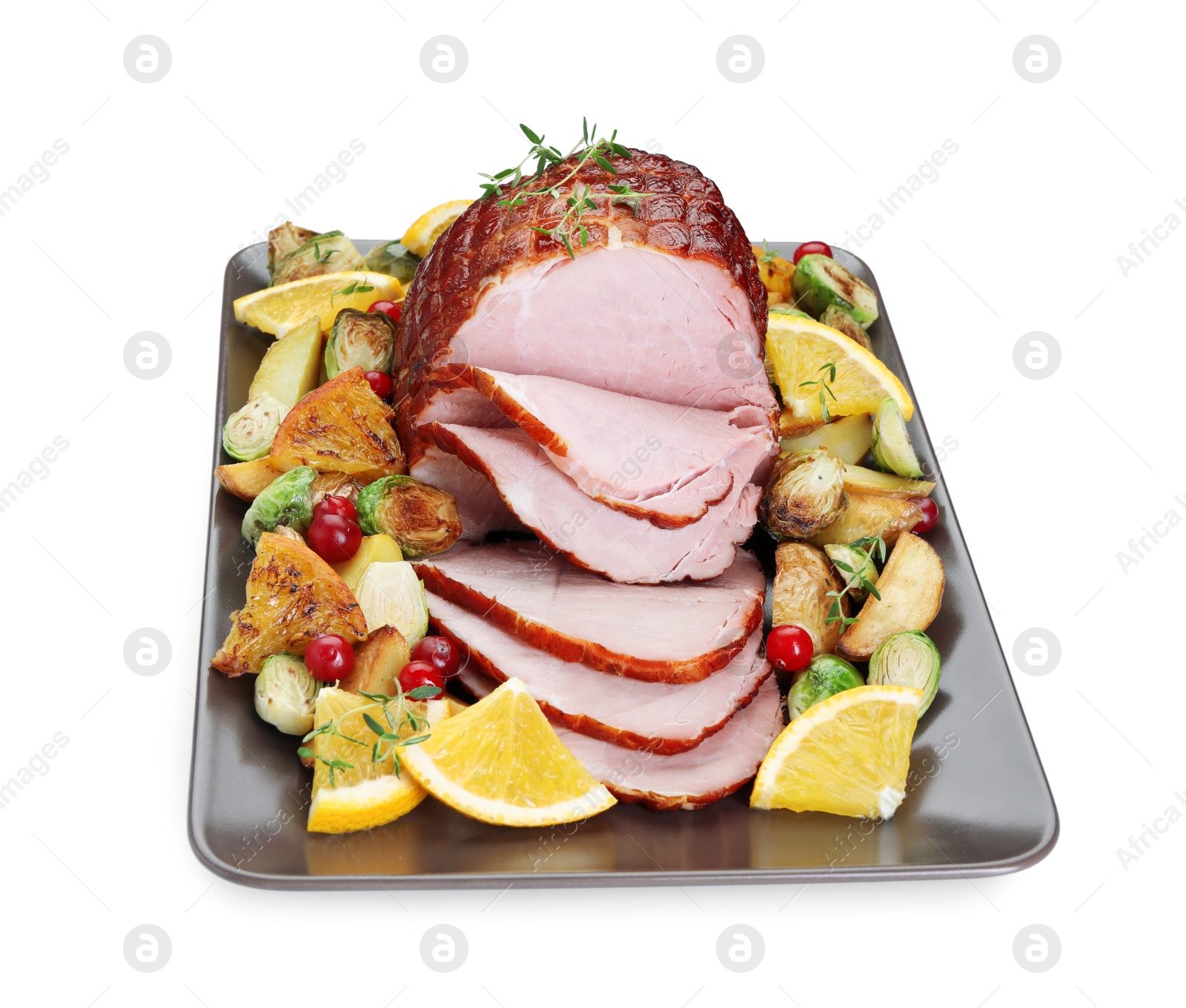 Photo of Tasty baked ham, vegetables and oranges isolated on white