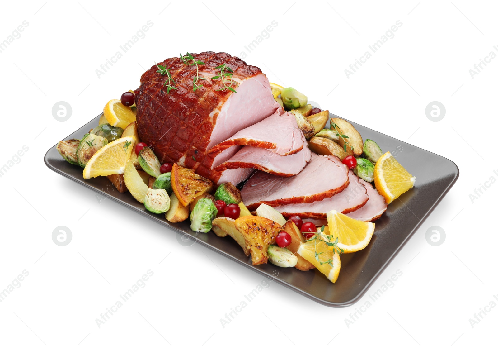 Photo of Tasty baked ham, vegetables and oranges isolated on white