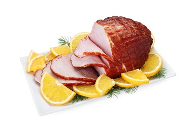 Photo of Tasty baked ham, rosemary and oranges isolated on white