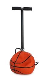 Photo of Deflated basketball ball and manual air pump isolated on white