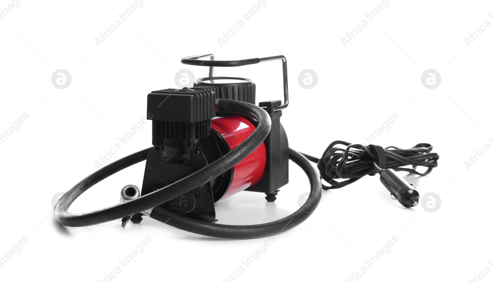 Photo of Air compressor with hose isolated on white