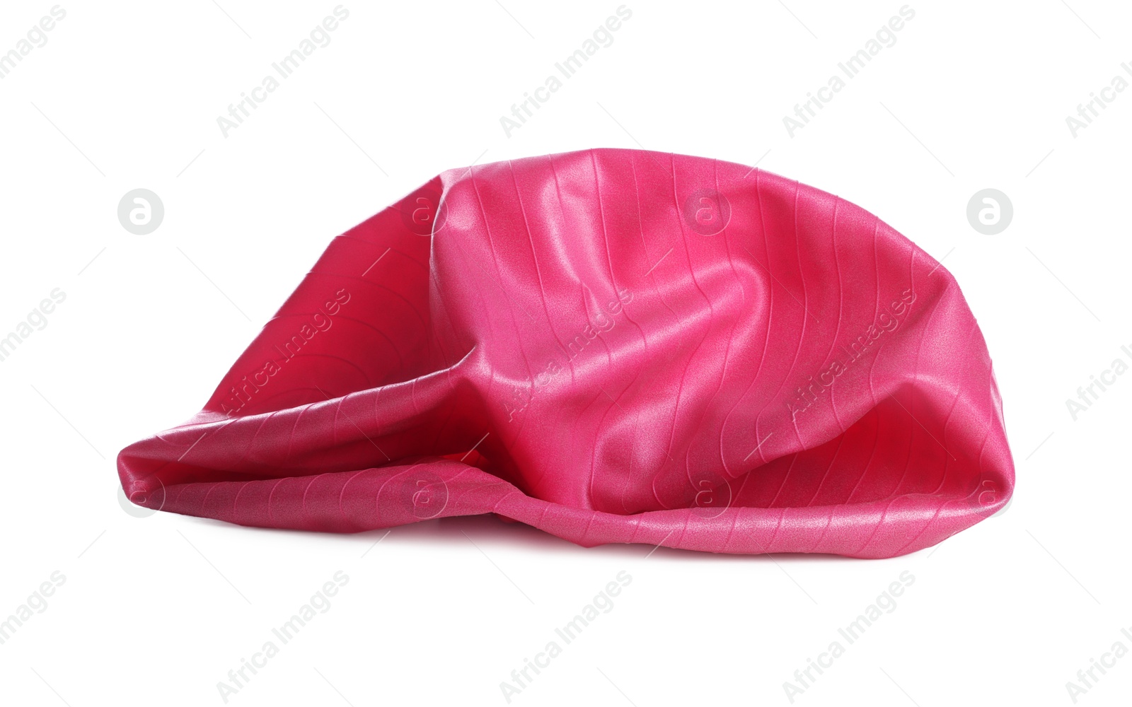 Photo of One deflated pink fitness ball isolated on white