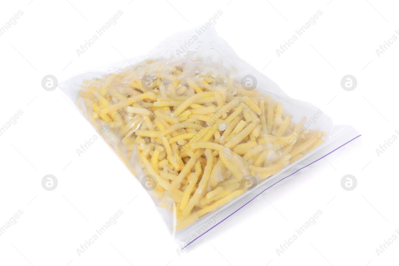 Photo of Frozen yellow beans in plastic bag isolated on white