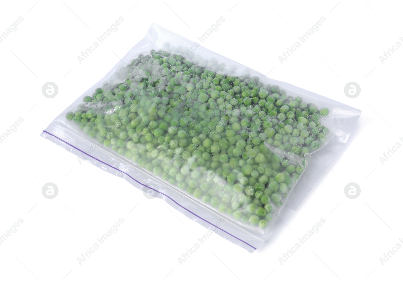 Photo of Frozen peas in plastic bag isolated on white