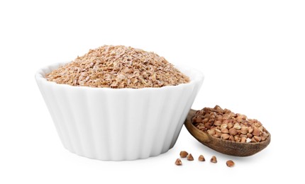 Photo of Buckwheat bran in bowl and grains isolated on white