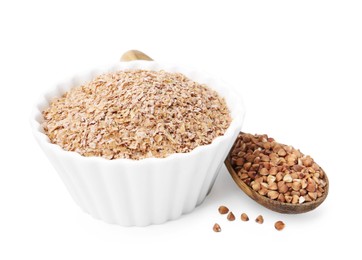 Photo of Buckwheat bran in bowl and grains isolated on white