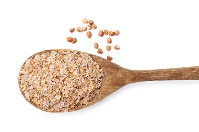 Buckwheat bran in wooden spoon and grains isolated on white, top view