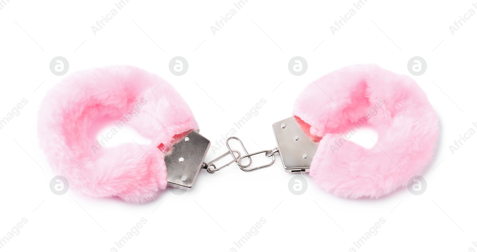 Photo of Pink fluffy handcuffs isolated on white. Sex toy