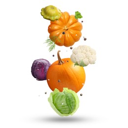 Image of Fresh vegetables, herbs and spices in air on white background