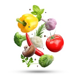 Image of Fresh vegetables, herbs and spices in air on white background