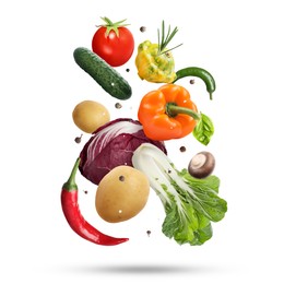 Image of Fresh vegetables, herbs and spices in air on white background