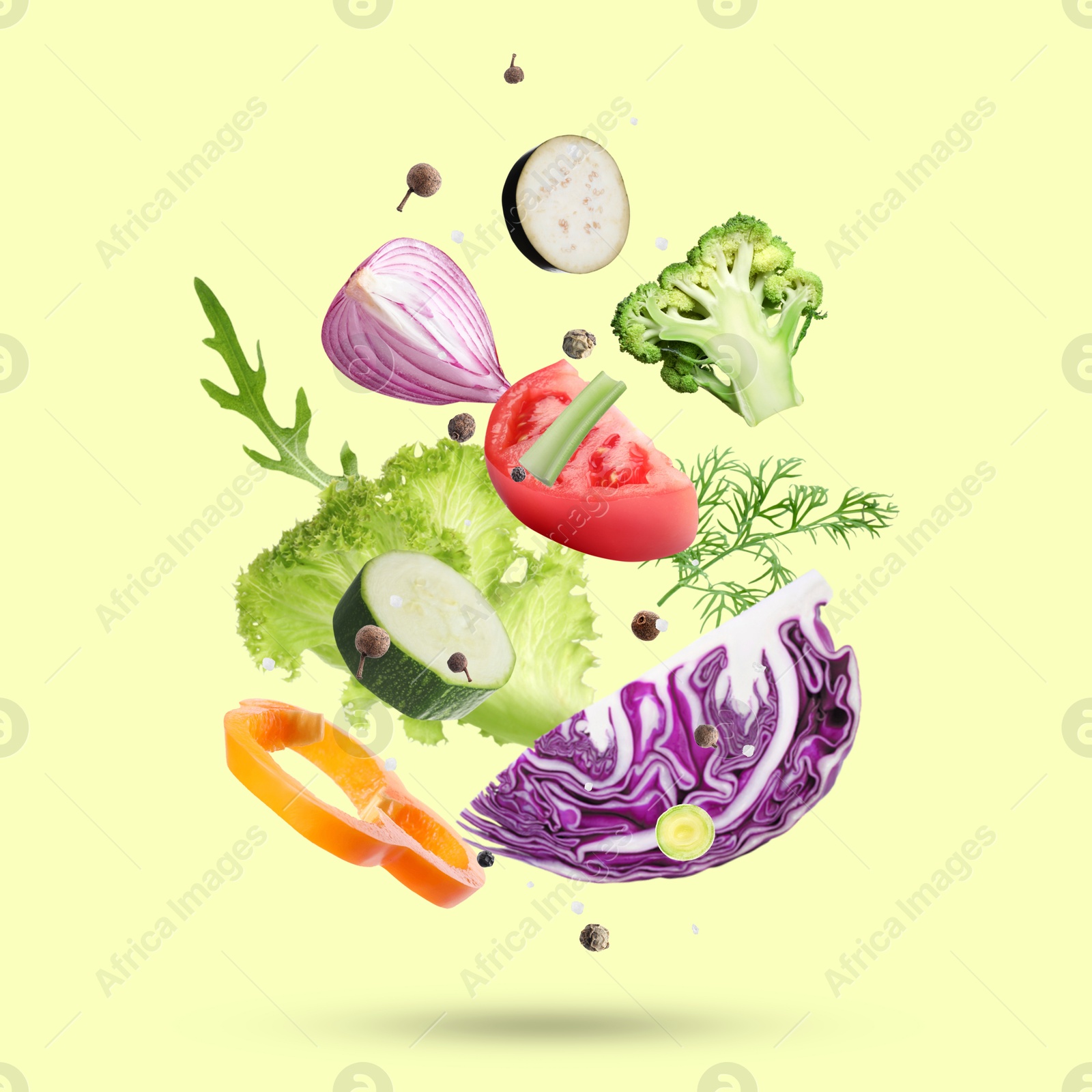 Image of Fresh vegetables, herbs and spices in air on beige background