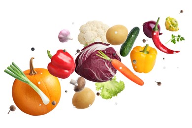 Image of Fresh vegetables, herbs and spices in air on white background