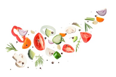 Image of Fresh vegetables, herbs and spices in air on white background