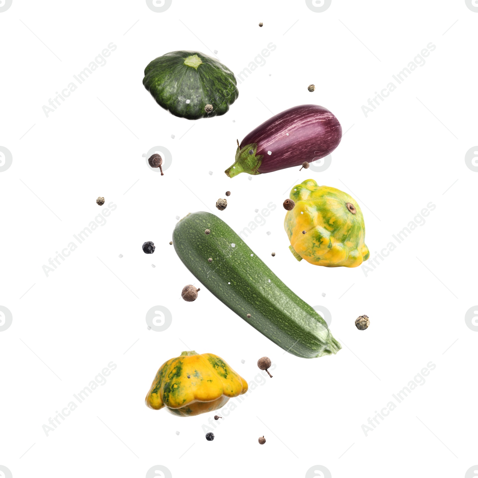 Image of Pattypan squashes, zucchini, eggplant and spices in air on white background