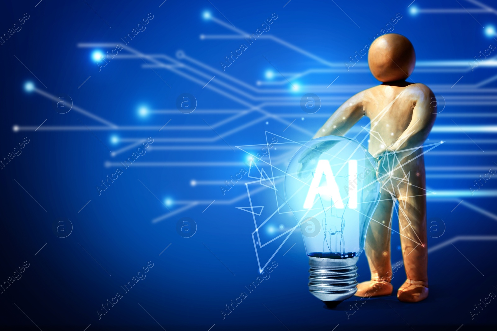 Image of Human figure holding light bulb with Ai abbreviation i against blue background with electronic circuit board pattern. Space for text