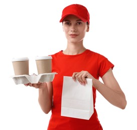 Photo of Fast-food worker with paper cups and bag on white background