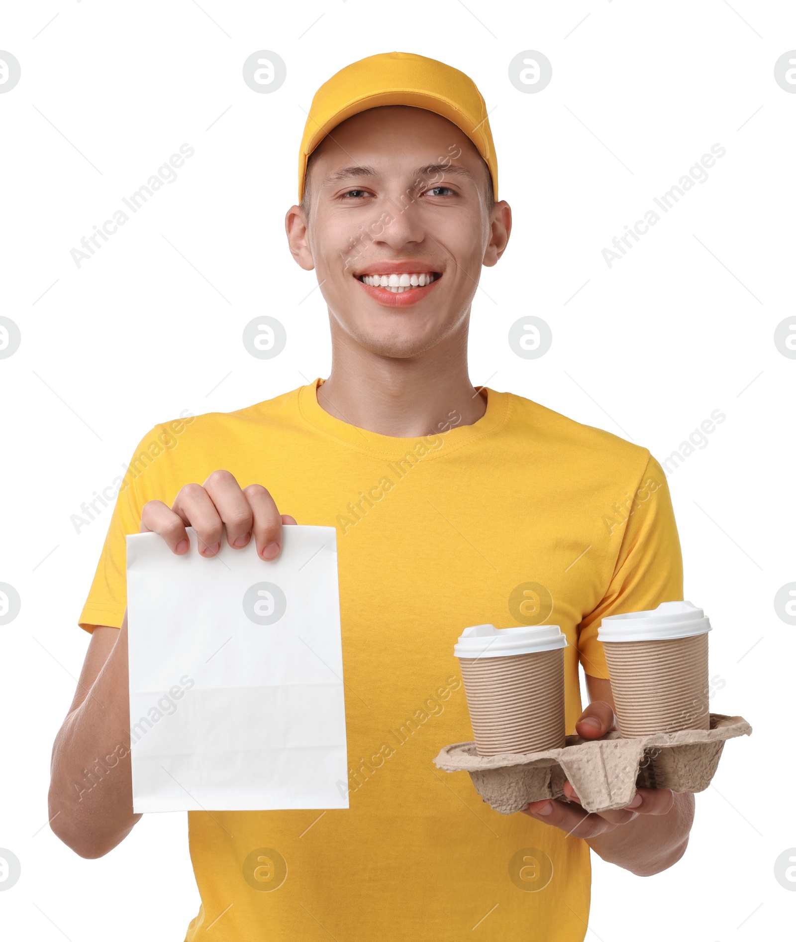 Photo of Fast-food worker with paper bag and cups on white background