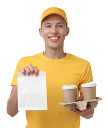 Photo of Fast-food worker with paper bag and cups on white background