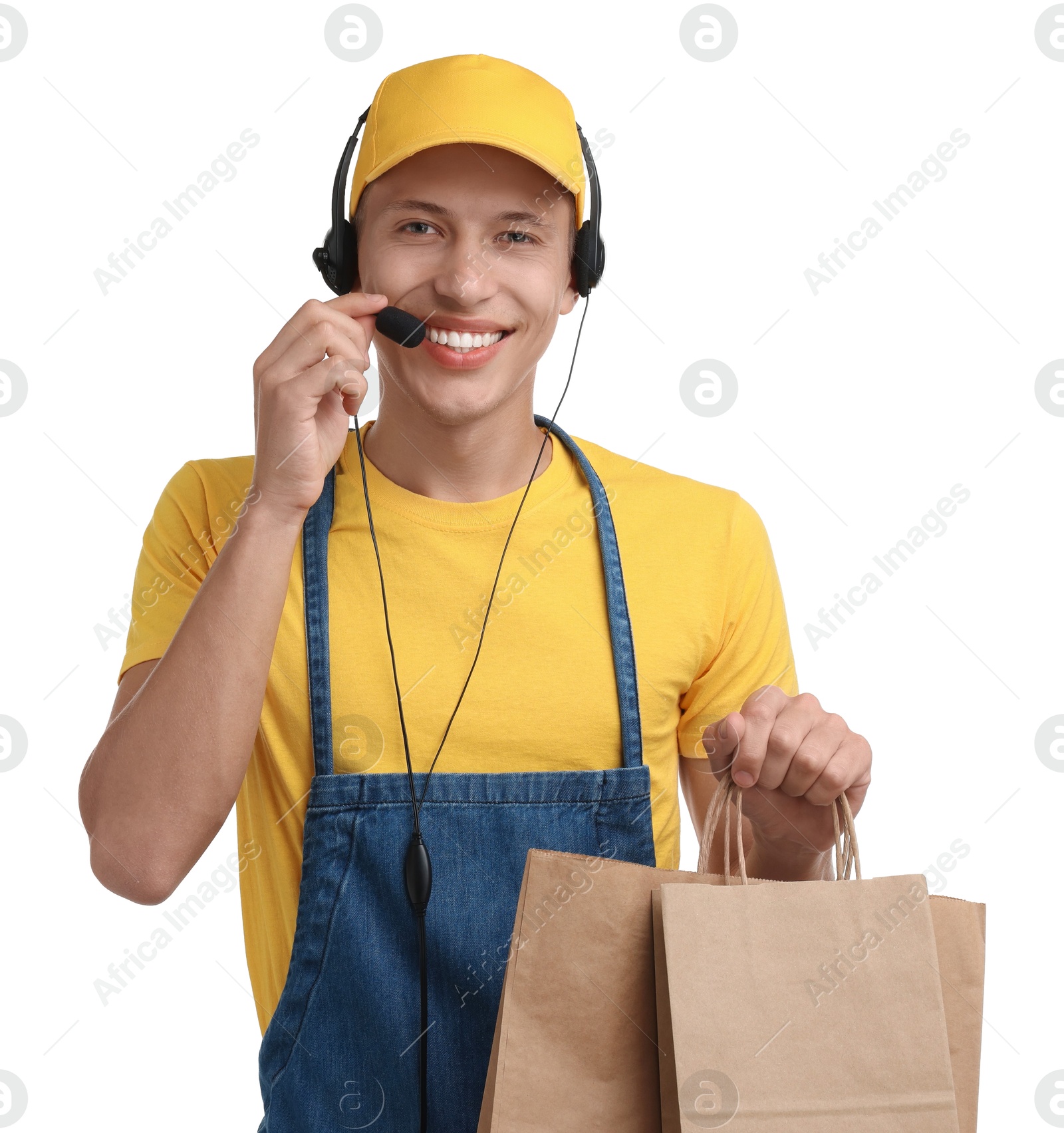 Photo of Fast-food worker with paper bags on white background