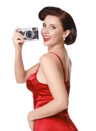 Pin-up woman with camera on white background