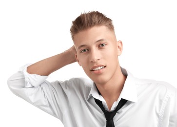 Confident young man with stylish haircut on white background