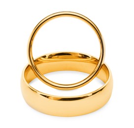 Photo of Beautiful golden wedding rings isolated on white