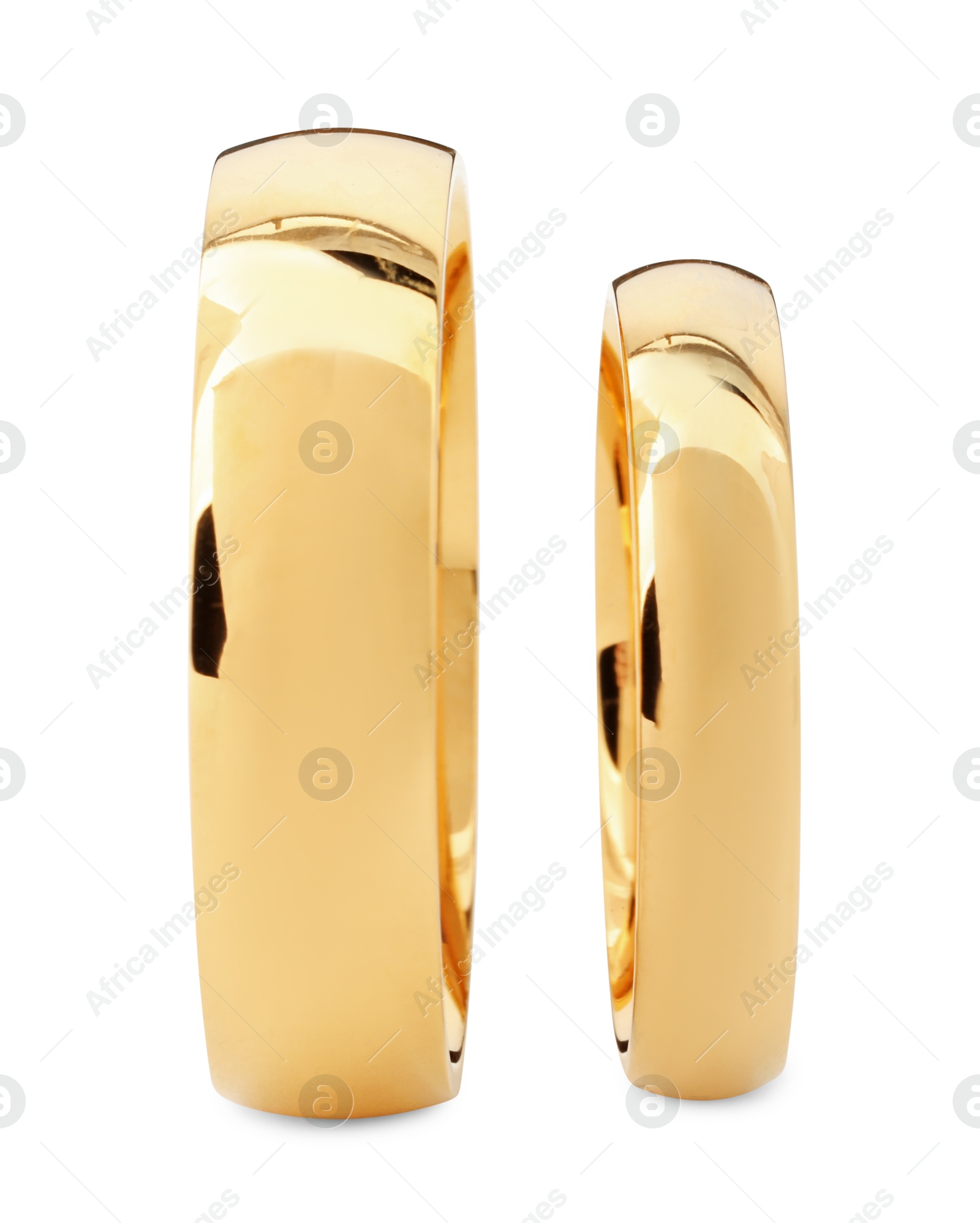 Photo of Beautiful golden wedding rings isolated on white