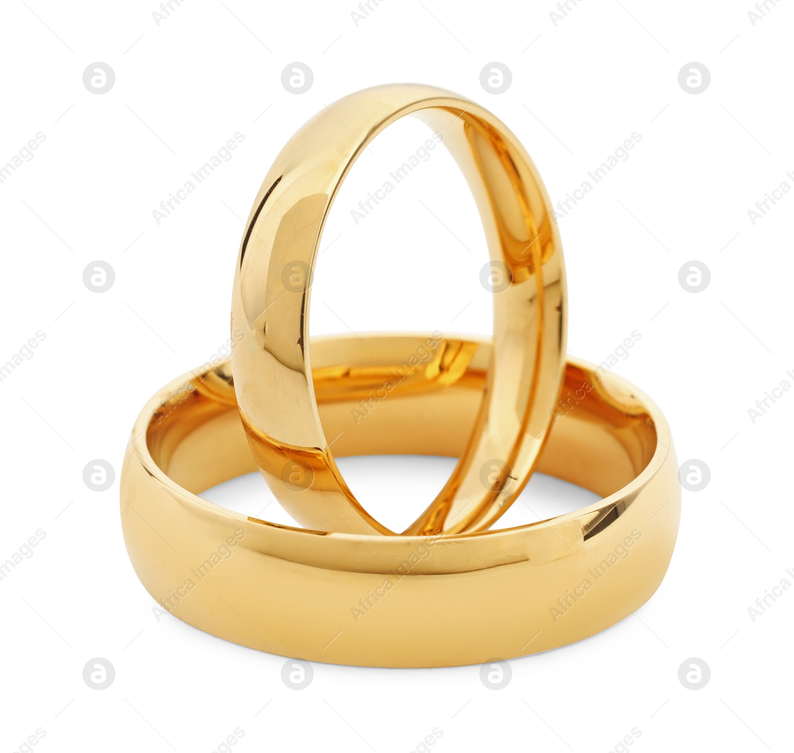 Photo of Beautiful golden wedding rings isolated on white