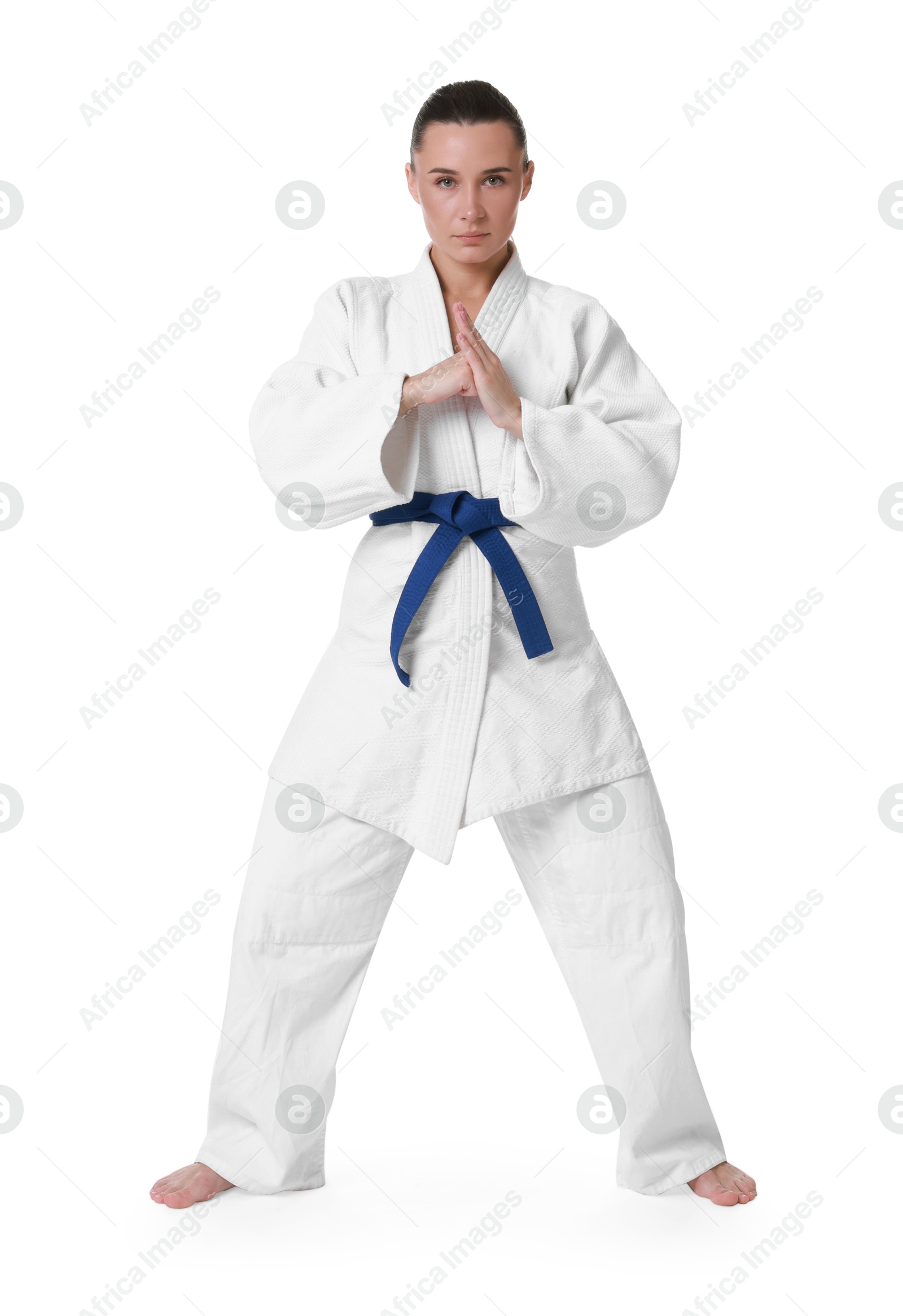 Photo of Karate fighter in kimono isolated on white