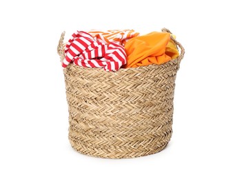 Photo of Wicker basket full of laundry isolated on white