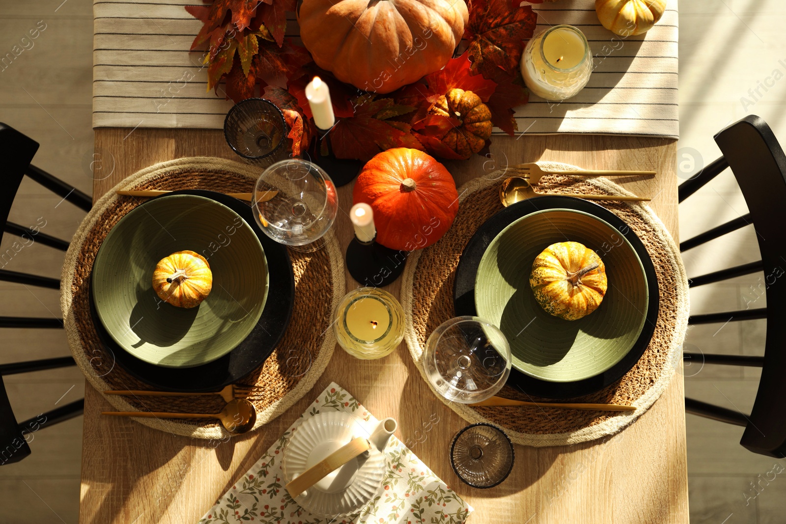 Photo of Stylish table setting with beautiful autumn decor in dining room, top view