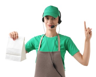 Fast-food worker with paper bag on white background